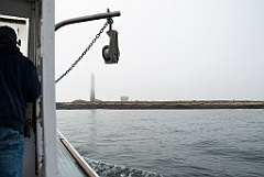 Lobsterman Prepares to Haul Traps by Petit Manan Light